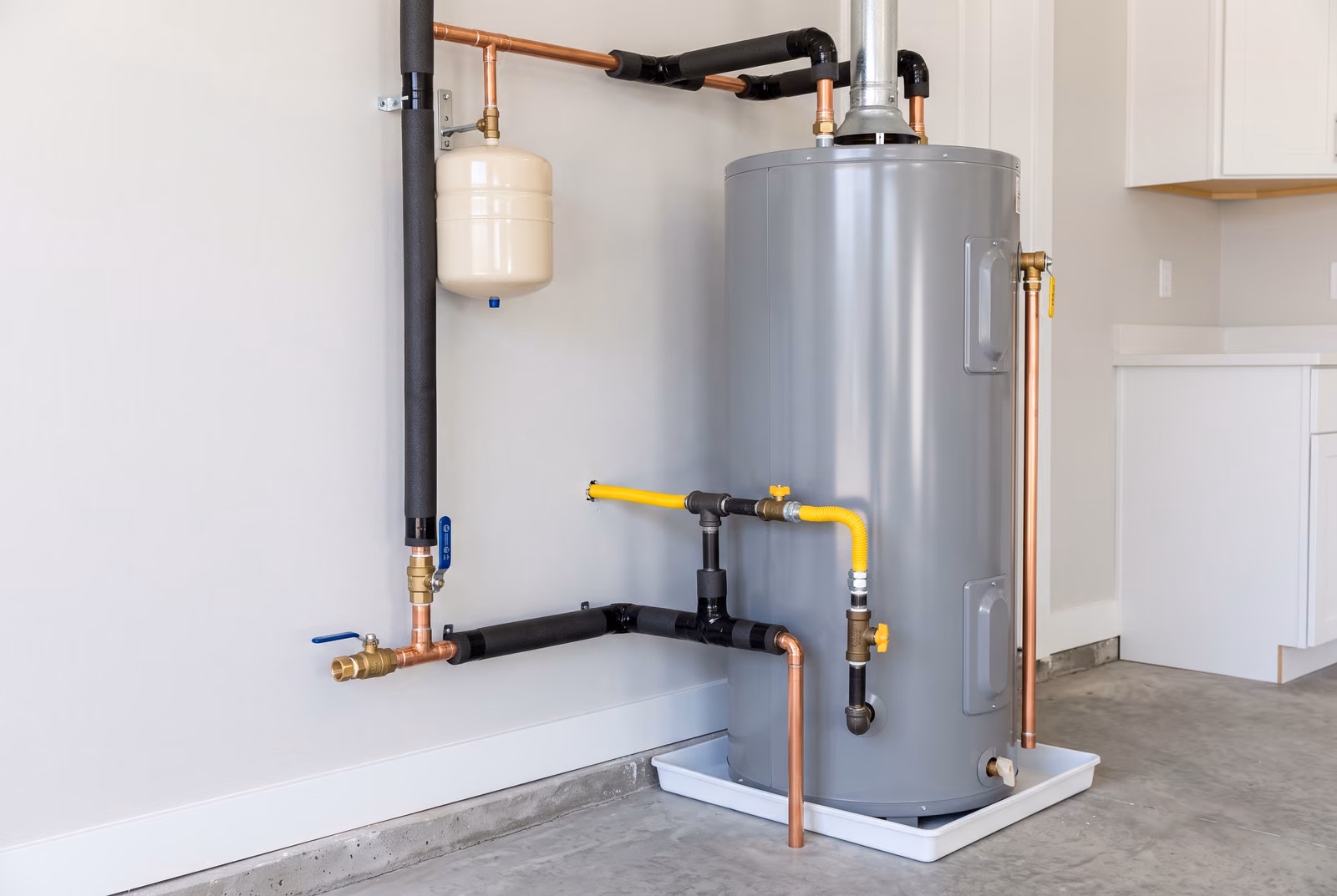 Newly installed water heater with fresh copper fittings